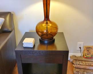 Cool, Pair Mid-Century-Style Amber Glass Lamps on a Pair of Dark Wood Side Tales