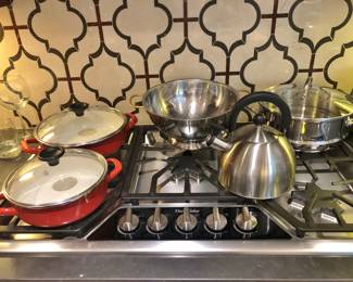Counter-Top Appliances and Red Enamel Cookware