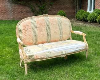 LOUIS XVI FRENCH CARVED FRAME UPHOLSTERED LOVESEAT | Louis XVI style Canape with striped upholstered cushions and carving on arms and legs. - h. 41.25 x w. 59 x d. 21.5 in