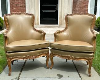 (2pc) PAIR LOUIS XV UPHOLSTERED CARVED FRENCH BEGERE ARMCHAIRS | Louis XV-style French Bergère chairs. Upholstered leather with wooden framed and carved finish. Seat height 18.5 in
Dimensions: h. 36.5 x w. 27.5 x d. 21.5 in