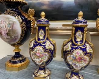 A pair of early 20th century late 19 century hand-painted vases