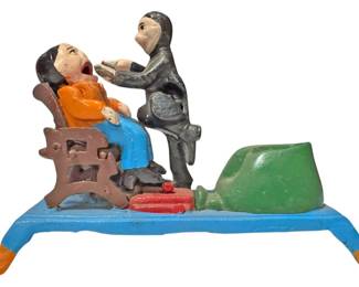Dentist Pulling Tooth Cast Iron Bank