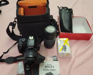 Canon EOS Rebel T3 1100D camera with a second lens, charger and bag