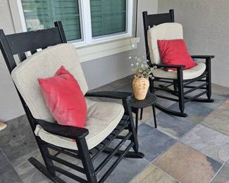 Pair of black wooden rockers  $250 with cushions
