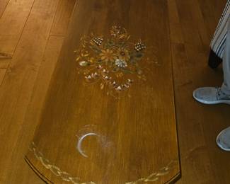 Here is another Hitchcock table with drop leaf sides 