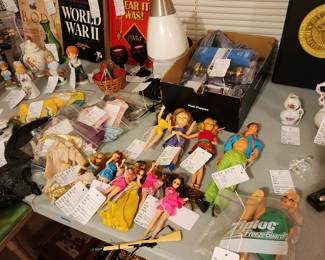 Dawn and Barbie and Ken and Skipper Dolls