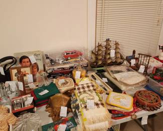 Model Boat, Die Cast Bank, and some of the coolest vintage kitchen linens we have had - including mushrooms and local advertising