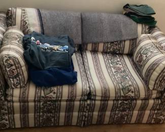 Patterned and striped loveseat