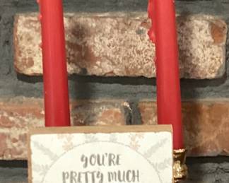 Brass candle stick holders with red candles