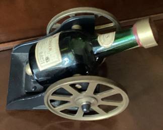 Courvoisier Napoleon ognac botter in a cannon shaped holder