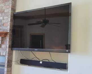 Sony Bravia Flat Screen Television And Vizio Sound Bar