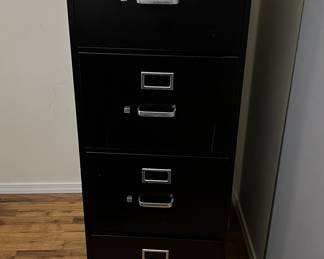 Upright 4 drawer metal file cabinet