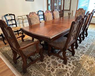 Dining table and 8 chairs; includes 2 leaves shown in the table.....