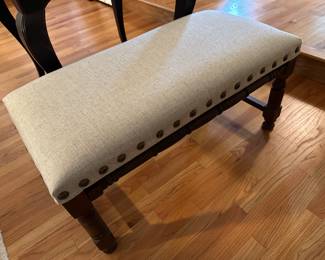 Bench with upholstered seat
