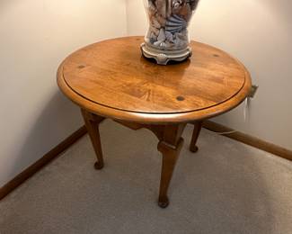 Round wood side table