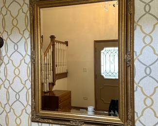 Wood framed wall mirror