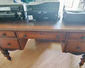 Nice wooden desk with inlaid leather top