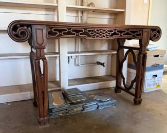 Vintage Chinese Rosewood console table, hand-carved. 31" H x 55" W dimensions are approximate. Qty: 1. Asking $400.