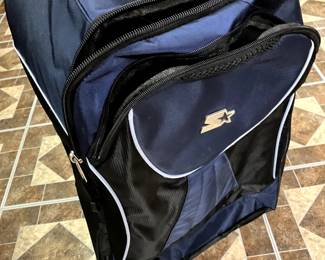 Carry-on sized soft-sided suitcase with wheels