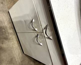 Metal cabinet with Formica top and chrome trim