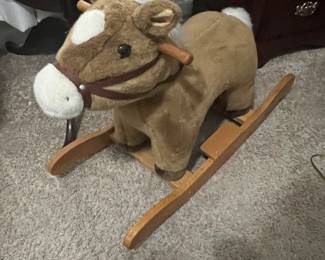 Rocking stuffed horse