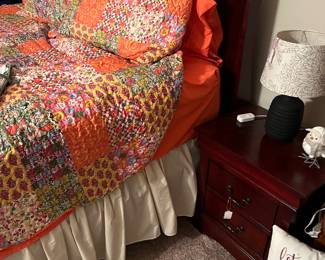 Sleigh bed with matching side tables and dresser