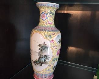 one of many hand painted vases