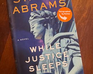 "While Justice Sleeps" Autographed by Stacey Abrams