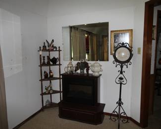 Fireplace. Metal Floor Clock