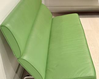 uthentic Charles & Ray Eames Compact Sofa for Herman Miller Circa 1950's. This sofa is known for its sleek, minimalist design and compact footprint, making it suitable for smaller spaces like executive suites, lounges, or urban apartments. It features a high, upright back with two horizontal foam pads, providing firm yet comfortable support. Great Condition!
