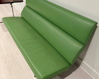 uthentic Charles & Ray Eames Compact Sofa for Herman Miller Circa 1950's. This sofa is known for its sleek, minimalist design and compact footprint, making it suitable for smaller spaces like executive suites, lounges, or urban apartments. It features a high, upright back with two horizontal foam pads, providing firm yet comfortable support. Great Condition!