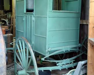 Covered Wagon With Side Entrance And Sliding Windows