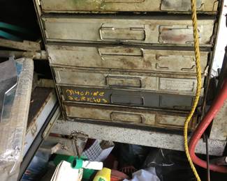 Container full of nuts and bolts