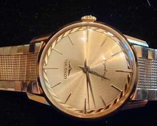 vintage mint condition 60's Longines Flagship Men's 18k gold wristwatch with original band and case.