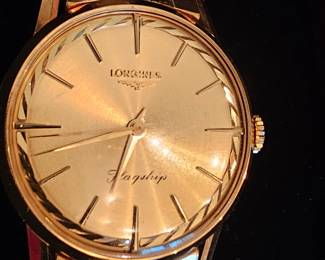 vintage mint condition 60's Longines Flagship Men's 18k gold wristwatch with original band and case.