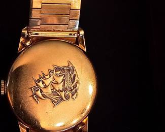 vintage mint condition 60's Longines Flagship Men's 18k gold wristwatch with original band and case.