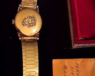 vintage mint condition 60's Longines Flagship Men's 18k gold wristwatch with original band and case.