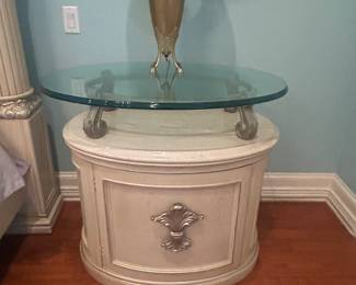 There are two of these nightstands and two lamps. They are sold as a set,and the nightstands with the bedroom suit.