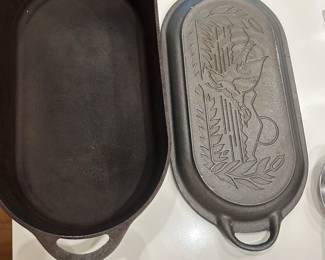 Discontinued by Lodge, very hard to find in good condition this Sportsman Deep Fish Fryer and Lid/ Cover-Griddle Total length is about 20 inches.The bottom is 4 1/4 inches tall & 9 1/2 inches wide.It holds 8 quarts.The bottom is marked Deep Fish Fryer 3060 made In U.S.A.The top is marked patent No. 21983 Made In U.S.A. It will fit over 2 burners on a stove.The top can be used for a griddle or the lid of the pan. It is in Good condition.