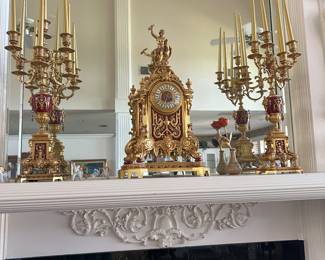 French Baroque, French Louis XIV style, reflecting the opulent and decorative. It is dore bronze (gilt bronze) and features intricate detailing, including the figure of a classical deity, likely Zeus. This piece came from Paris France. Contact Seller.