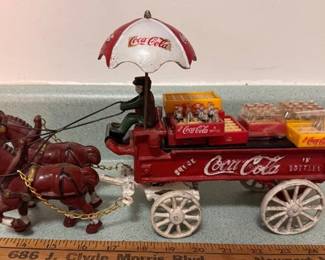 Coca-Cola cast iron horse drawn delivery wagon