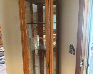 gorgeous solid oak curion cabinet with light