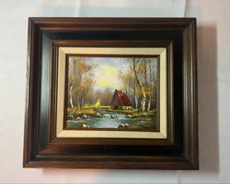 Framed Painting Cabin with Red Roof by A River