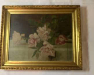 Framed Pink Flowers on A Table