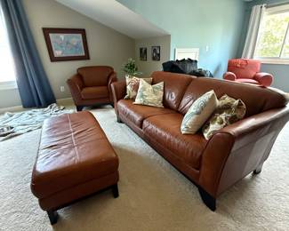Brown Leather Couch
85in x 36in x 33in
Brown Leather Ottoman
47in x 23 in x 18in