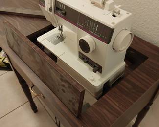 Vintage Sewing Machine in Hideaway Table