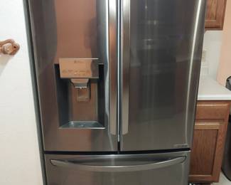 Very high end LG refrigerator with light use.