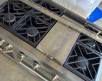 Beautiful Monogram 6 burner stove available along with matching monogram dishwasher