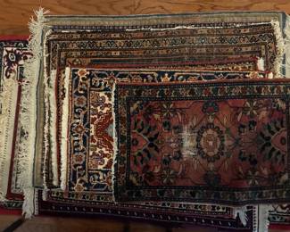 A nice selection of various sized rugs