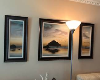 Set of three matching framed landscape prints with floor lamp